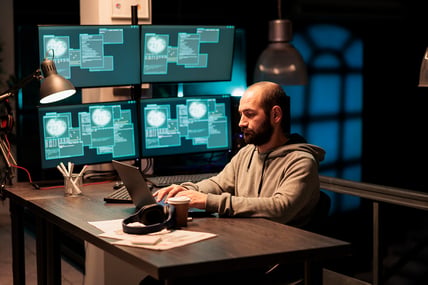 hacker-programmer-hacking-system-at-office